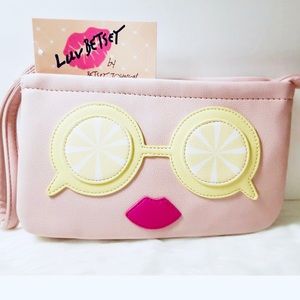 Fun! Lemon eyes wristlet.